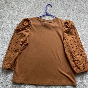 mustard blouse with detailed sleeves